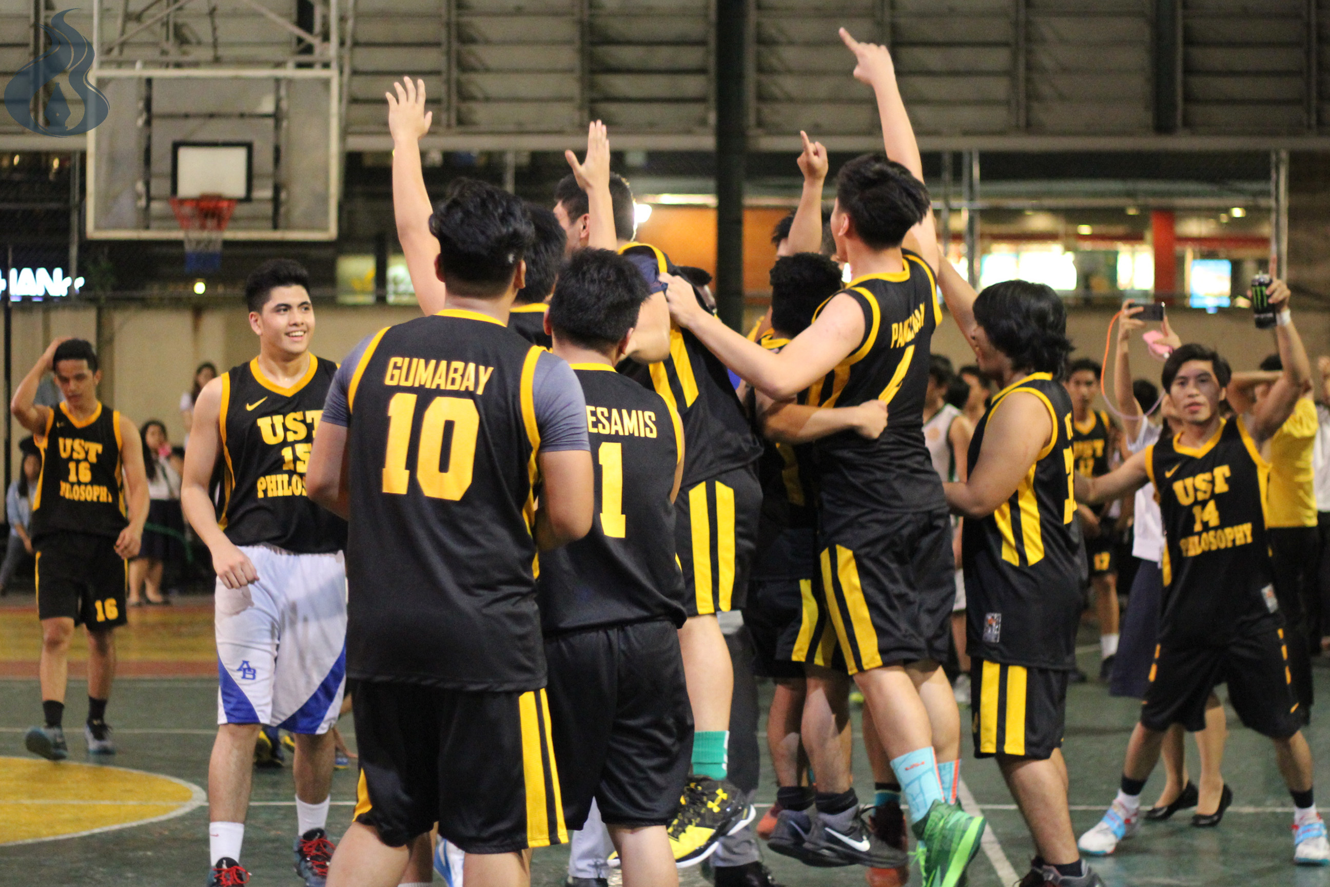 The team of Philosophy celebrates after wresting this year's AB Sportsfest basketball championship. photo by Maria Inna Franceska R. Lagazon