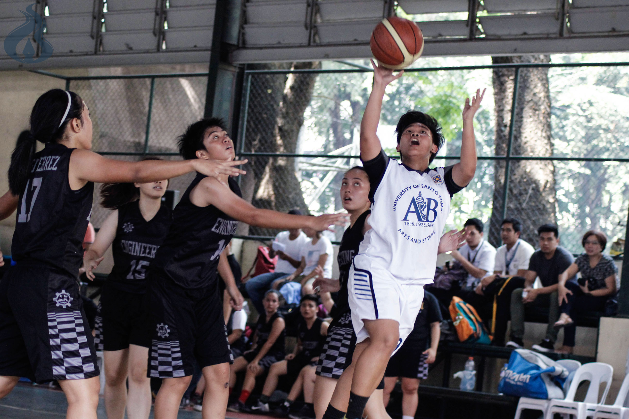 Alaina Dimdam tries to shoot a basket after penetrating the defense of the Engineering squad. photo by LORENZO ABEL S. DIONISIO